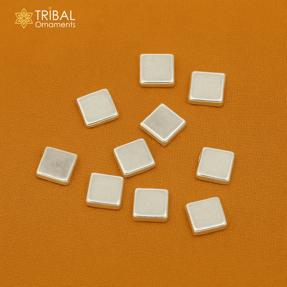 Tiny silver Barfi sweets for Diwali puja, intricate silver cake Prasadam from Tribal Ornaments, Indian worshipping silver article.