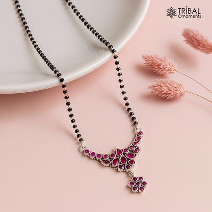 Sterling silver black beads and red cut stone brides Mangalsutra chunky necklace by TRIBAL ORNAMENTS, featuring traditional Indian jewelry design.