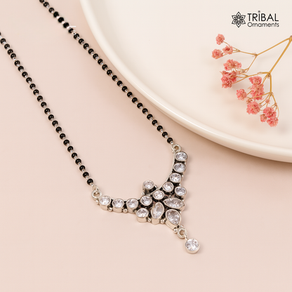Sterling silver Mangalsutra necklace with black beads and white cut stone beads, chunky design by TRIBAL ORNAMENTS.