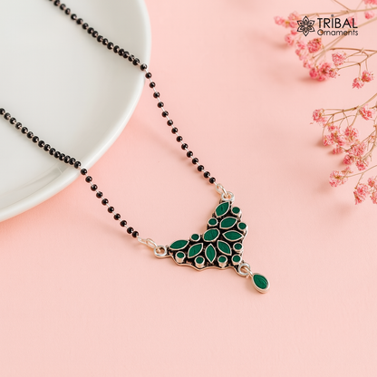 925 sterling silver black beads chain Mangalsutra necklace featuring green stone pendant, designed for daily wear and brides.