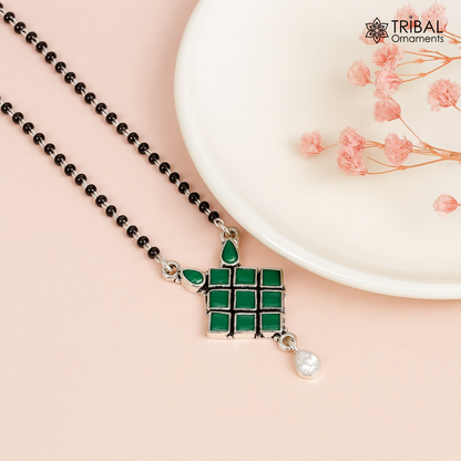 925 sterling silver mangasutra necklace with green stone pendant and black beads chain, traditional tribal jewelry design.