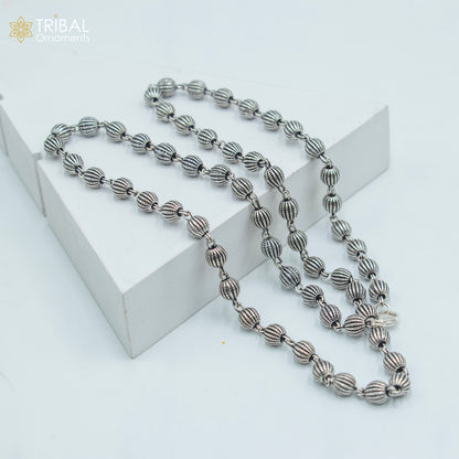 Sterling silver beaded chain necklace by Tribal Ornaments, delicate and handmade, suitable for unisex jewelry, 4mm thickness.