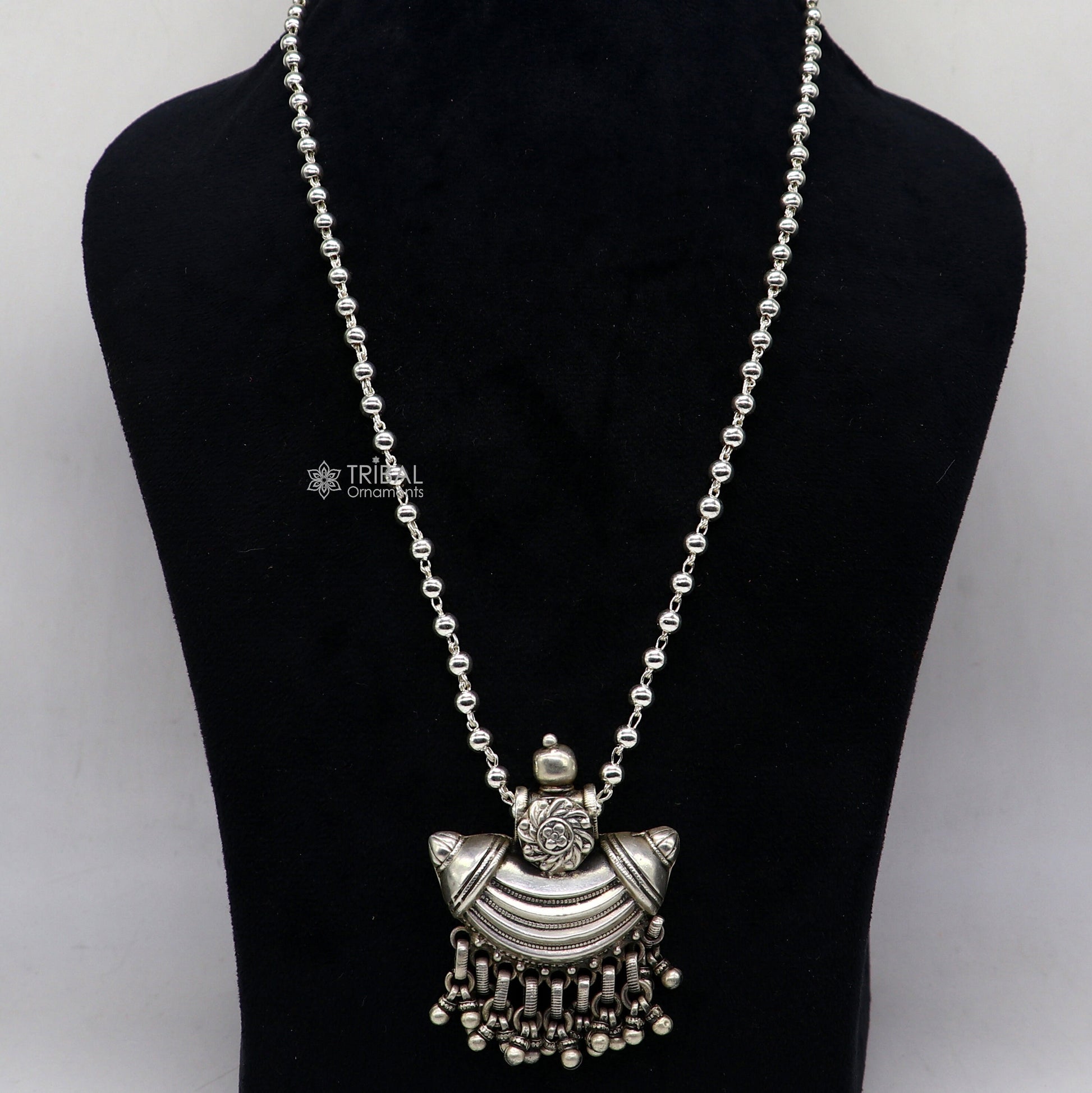 925 sterling silver tribal pendant with ethnic temple design from Indian jewelry, featuring intricate tribal ornament details.