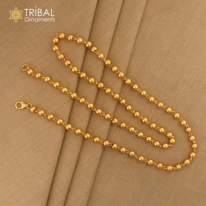 Sterling silver gold-polished beaded necklace by Tribal Ornaments, stylish unisex jewelry with handcrafted beaded chain.