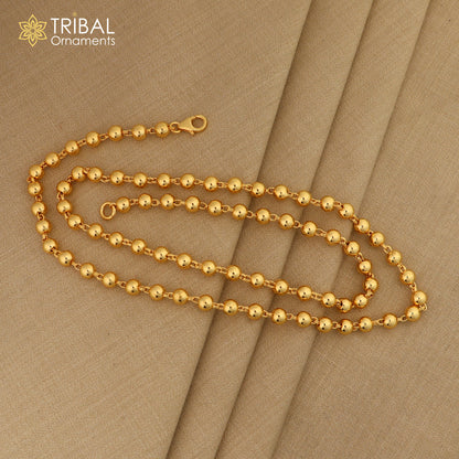 Sterling silver and gold polished beaded necklace by TRIBAL ORNAMENTS, stylish unisex jewelry with handcrafted beaded chain.