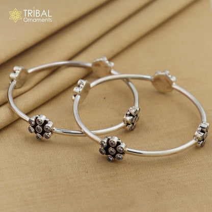 Sterling silver cubic zircon bangle bracelet by TRIBAL ORNAMENTS, plain design with a sparkling cubic zircon stone, ideal for brides or girls.