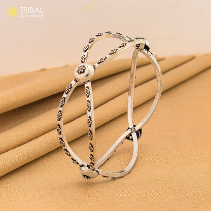 925 sterling silver bangle bracelet by TRIBAL ORNAMENTS, featuring intricate design and customized belly dance jewelry style.