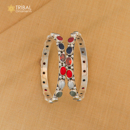 925 sterling silver tribal beaded bangle with colorful stones, showcasing intricate tribal jewelry design.