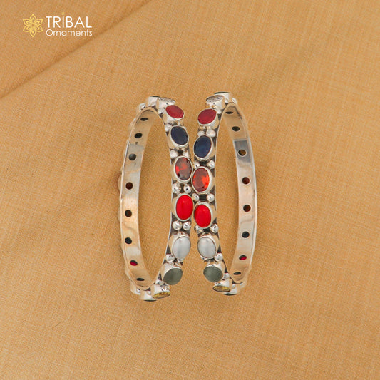 925 sterling silver tribal beaded bangle with colorful stones, showcasing intricate tribal jewelry design.