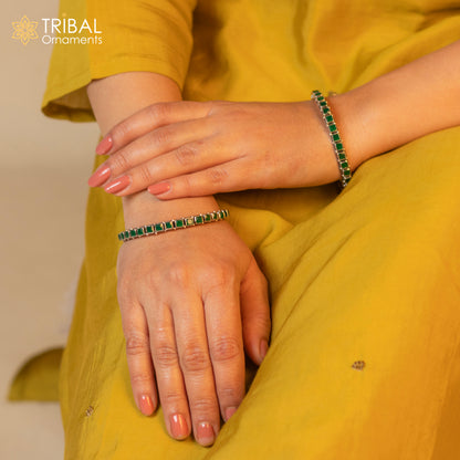 Sterling silver bangle bracelet with green square-shaped stone, tribal design, ideal for anniversary gifting by Tribal Ornaments.