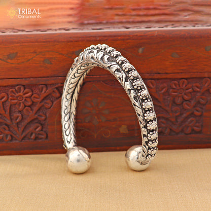 Sterling silver vintage cuff bangle with intricate chitai work, handcrafted tribal jewelry by TRIBAL ORNAMENTS.