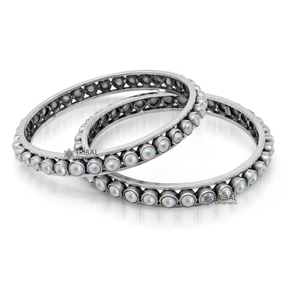 Handmade 925 sterling silver bangle with lustrous mother-of-pearl, perfect for brides and cultural jewelry by Tribal Ornaments.