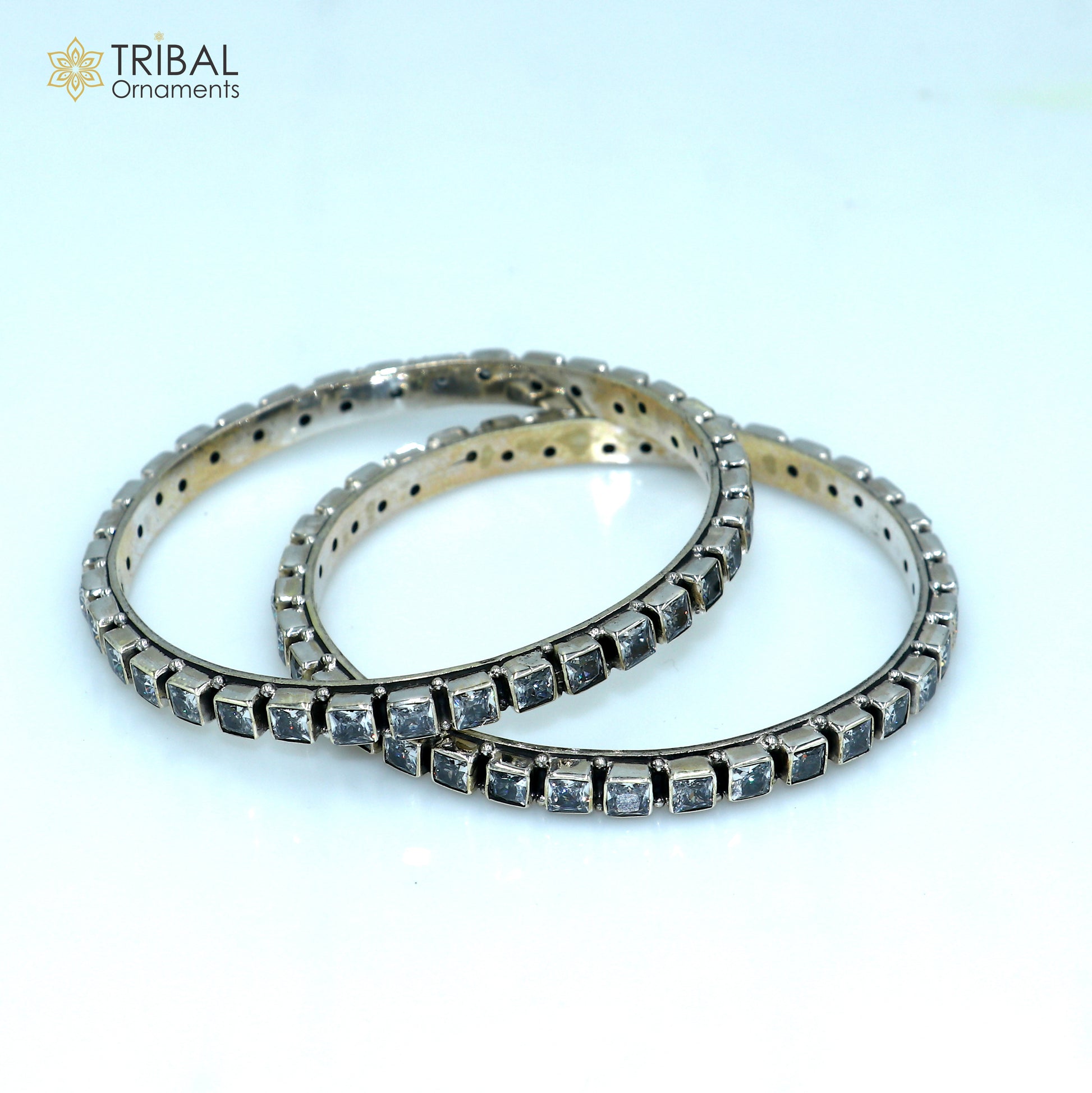 Sterling silver bangle bracelet with cubic zirconia stones, vintage tribal jewelry for wedding or anniversary gifts.