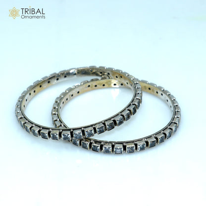 Sterling silver bangle bracelet with cubic zirconia stones, vintage tribal jewelry for wedding or anniversary gifts.