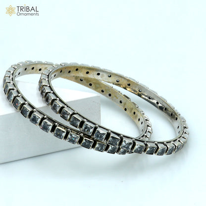 Sterling silver bangle bracelet with cubic zirconia stones, vintage tribal jewelry, ideal for wedding or anniversary gifting.