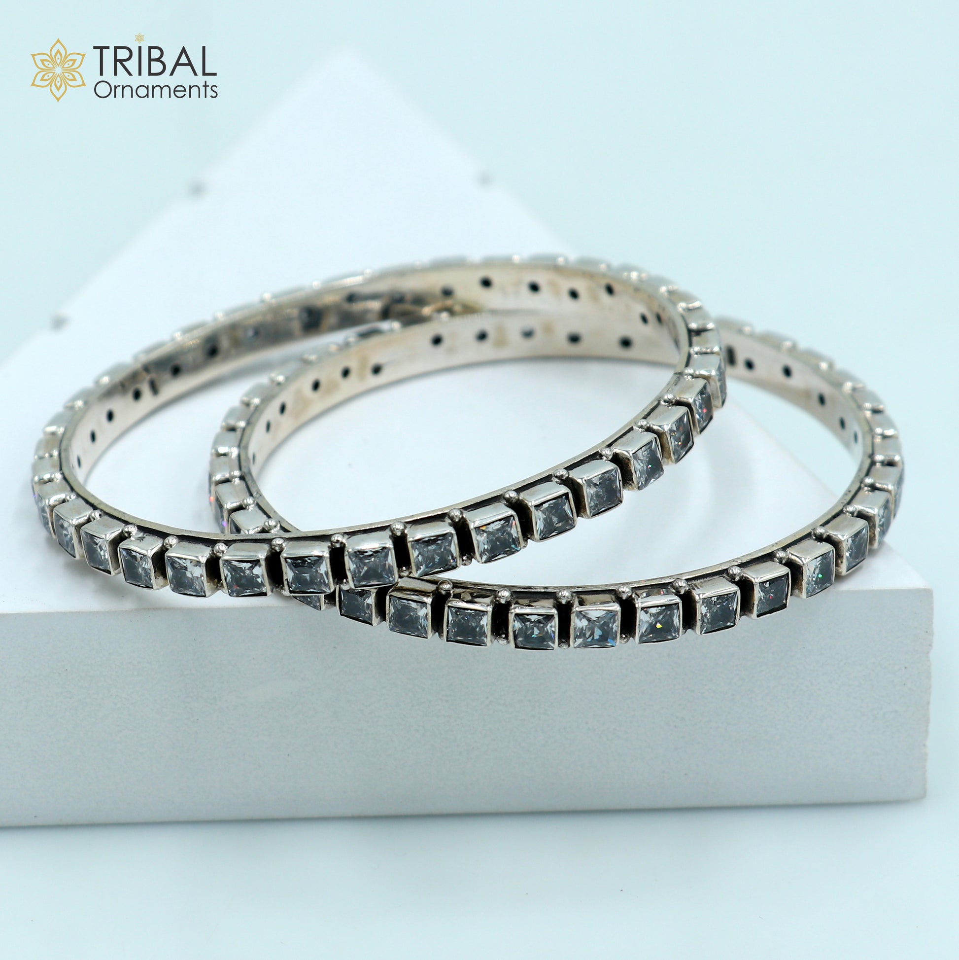 Sterling silver bangle bracelet with cubic zirconia stones, vintage tribal jewelry for wedding or anniversary gifting.