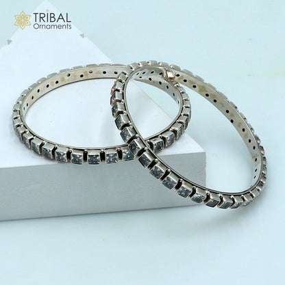 Sterling silver bangle bracelet with cubic zirconia stones, vintage tribal jewelry for wedding or anniversary gifts.