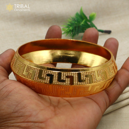 Stylish heavy silver gold polished bangle or Kada from Tribal Ornaments, made of 999 pure silver for a sleek, elegant look.