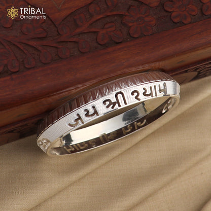 Silver bangle Kada featuring the Jai Shree Shyam Krishna mantra, shiny 999 pure silver stylish jewelry from Tribal Ornaments.