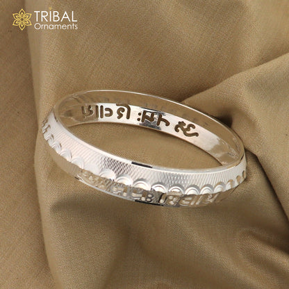 Silver bangle featuring Om Namah Shivay and Shiva mantra, stylish tribal design in shiny 999 pure silver from TRIBAL ORNAMENTS.