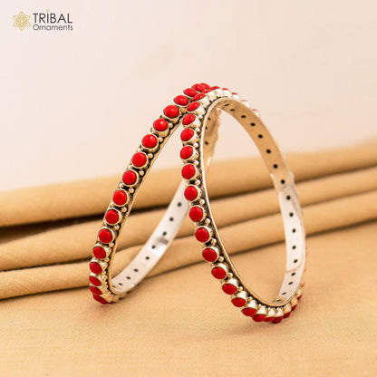 925 sterling silver coral stone bangle bracelet with intricate tribal design, showcasing unique functional jewelry style.
