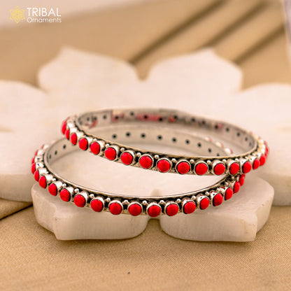 925 sterling silver coral stone bangle bracelet by TRIBAL ORNAMENTS featuring a unique, functional jewelry design with intricate details.