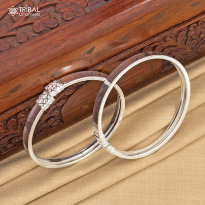 Shiny 925 sterling silver bangle bracelet with plain design by Tribal Ornaments, suitable for men or women, elegant gifting jewelry.
