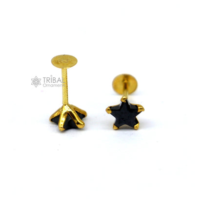 18kt yellow gold handmade star-shaped black onyx cartilage stud earring in various sizes, unisex jewelry by Tribal Ornaments.