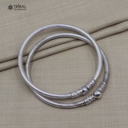 Sterling silver custom stylish ball design bangle kada featuring tribal ornament details and intricate craftsmanship.