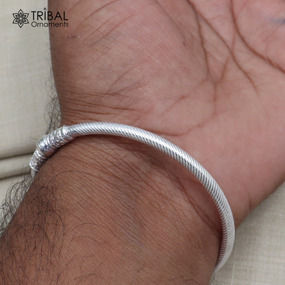 Sterling silver customized bangle with stylish ball design, tribal jewelry style from TRIBAL ORNAMENTS.