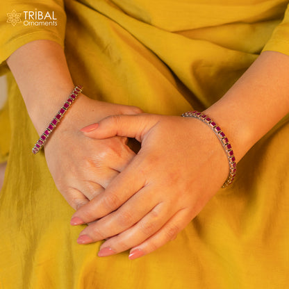 925 sterling silver bangle bracelet with a vibrant red cut stone, stylish jewelry for girls and women by TRIBAL ORNAMENTS.