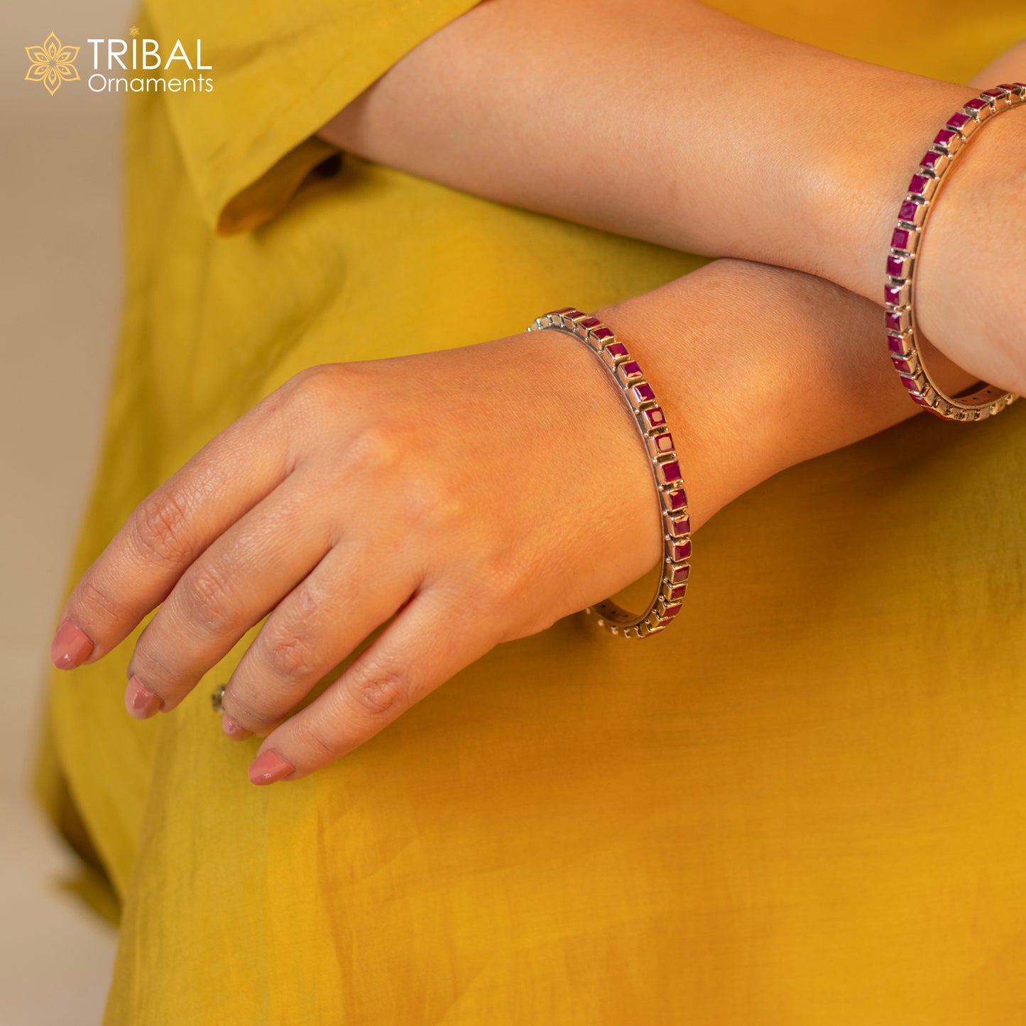 Sterling silver bangle bracelet with a vibrant red cut stone, stylish jewelry for women and girls by TRIBAL ORNAMENTS.