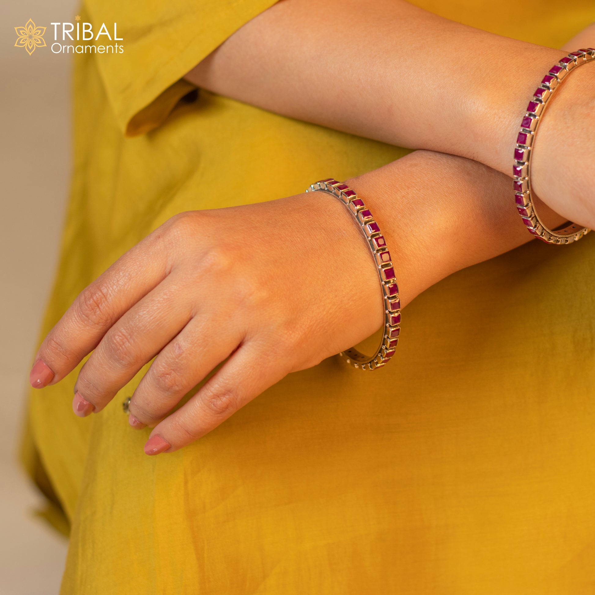 Sterling silver bangle bracelet with a vibrant red cut stone, stylish jewelry for women and girls by TRIBAL ORNAMENTS.