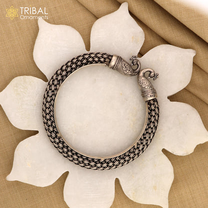 Sterling silver handmade vintage peacock design bangle bracelet by TRIBAL ORNAMENTS, unisex, customizable hip-hop jewelry.