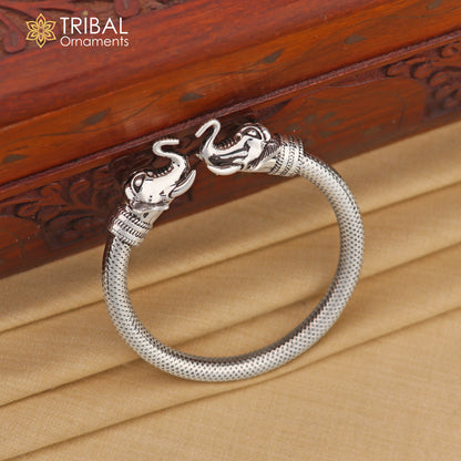 Sterling silver elephant face bangle bracelet by Tribal Ornaments, unisex design, 2.6-inch kada jewelry for gifting.