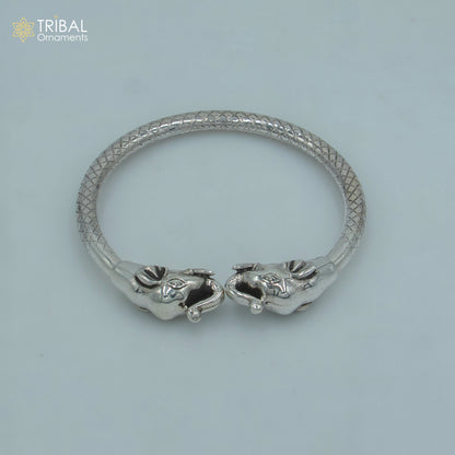 Handmade 925 sterling silver Elephant design bangle bracelet by TRIBAL ORNAMENTS, showcasing intricate tribal silver jewelry craftsmanship.