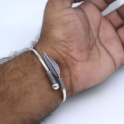 Sterling silver handmade leaf design kada bangle bracelet by Tribal Ornaments, featuring tribal jewelry style and intricate leaf detailing.