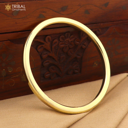 Shiny plain Ashtdhatu round tube design bangle from Tribal Ornaments, unisex jewelry with customizable style.