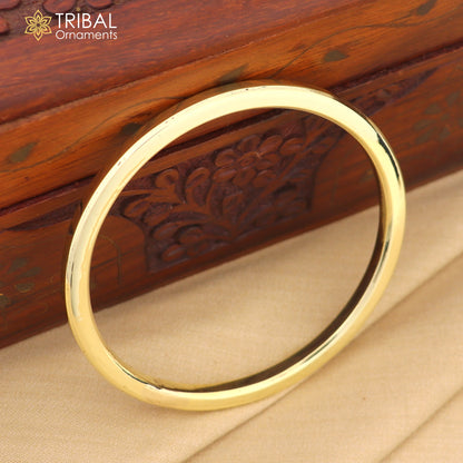 Shiny plain Ashtdhatu round tube design unisex kada bangle from Tribal Ornaments, customized jewelry for men and women.