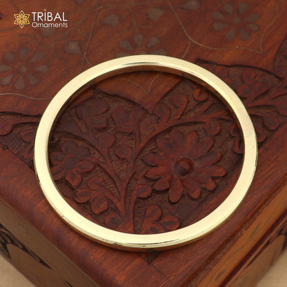 Unisex Ashtdhatu Kada bangle with round tube design, plain shiny finish, customized jewelry by TRIBAL ORNAMENTS.