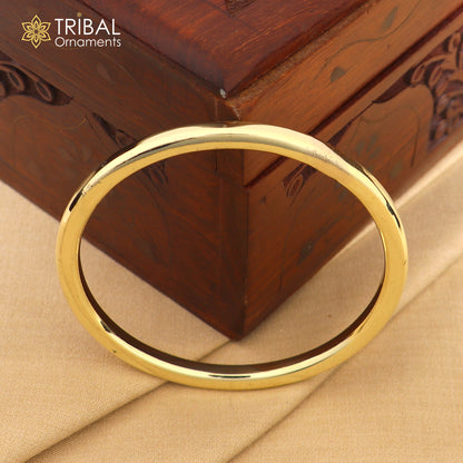 Unisex Ashtdhatu kada bangle with round tube design, shiny plain finish, customized jewelry by TRIBAL ORNAMENTS.