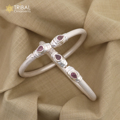 Sterling silver tribal bangle bracelet featuring a detailed lion face design, handmade tribal jewelry by Tribal Ornaments.
