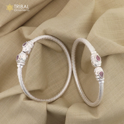 Sterling silver tribal bangle bracelet with a detailed lion face design, handmade tribal jewelry by Tribal Ornaments.