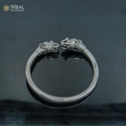 Handmade 925 sterling silver bangle bracelet featuring an elephant design, crafted by Tribal Ornaments, with a plain finish.