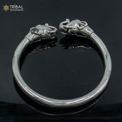 Handmade 925 sterling silver Elephant design plain bangle bracelet by TRIBAL ORNAMENTS, showcasing detailed elephant motifs.