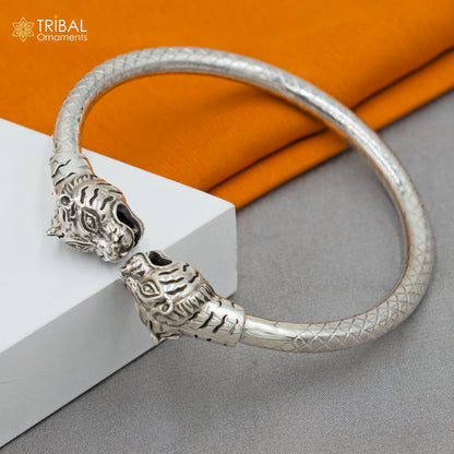 925 sterling silver handmade lion face design bangle bracelet by TRIBAL ORNAMENTS, featuring intricate tribal-style craftsmanship.