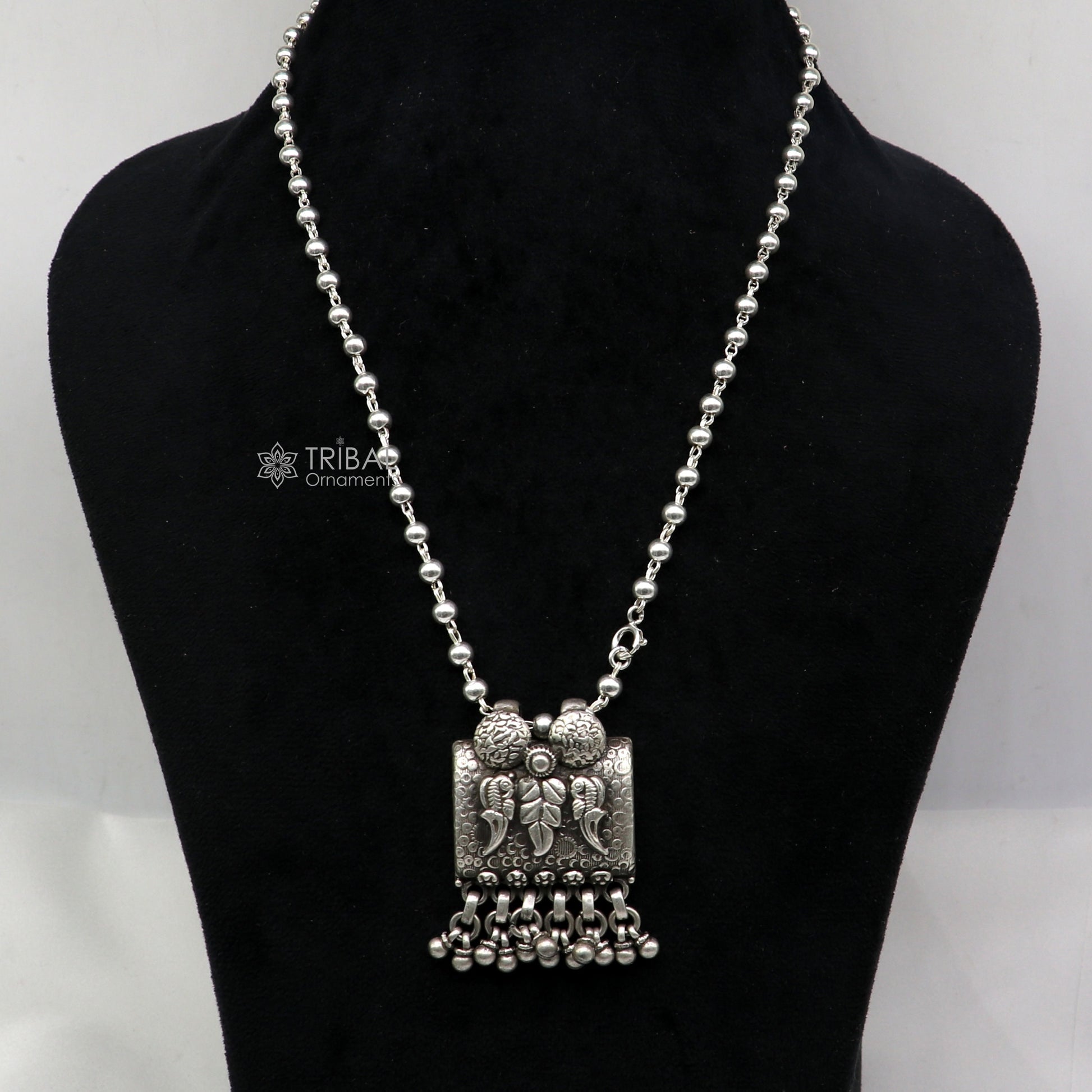 925 sterling silver bird design pendant with beaded necklace by TRIBAL ORNAMENTS, featuring intricate tribal craftsmanship.