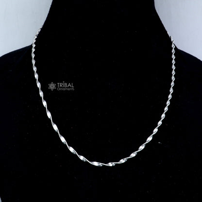 18-inch sterling silver twisting chain necklace by TRIBAL ORNAMENTS, unisex jewelry with handmade design and elegant twist detail.