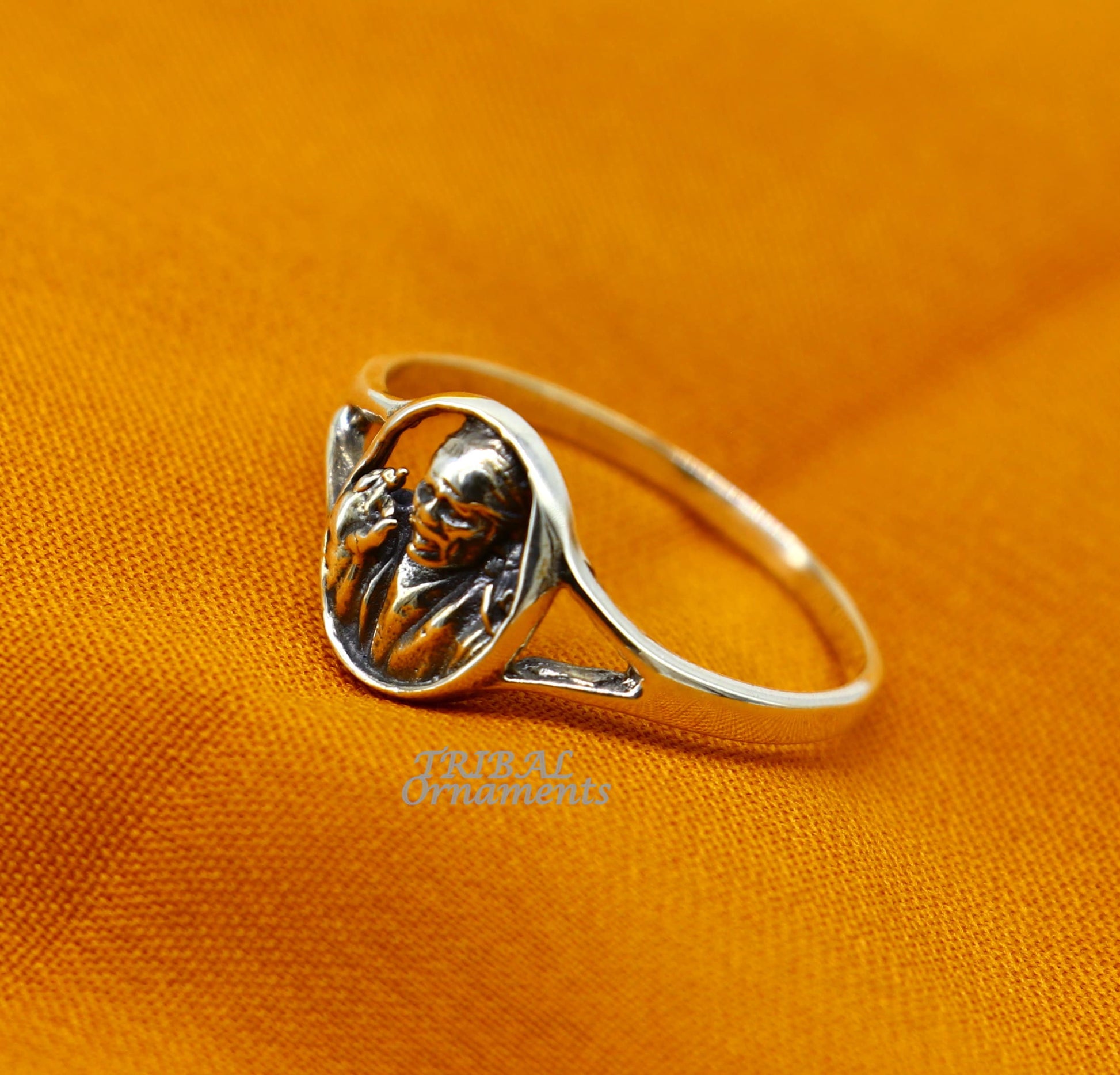 Sterling silver Sai Baba ring band with vintage antique style, detailed design, ideal for wedding or bridal jewelry in India.