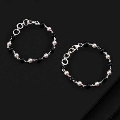 Sterling silver and black beaded chain bracelet and anklet set by Tribal Ornaments, ideal for girls or babies, versatile jewelry accessory.